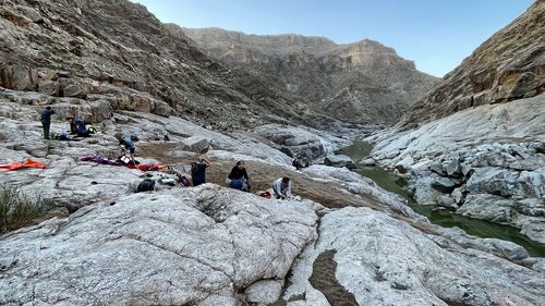 People on rocky mountains