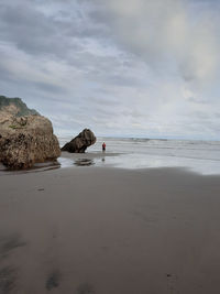 Scenic view of beach against sky