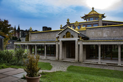 View of historical building against cloudy sky