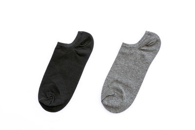 Close-up of shoes against white background