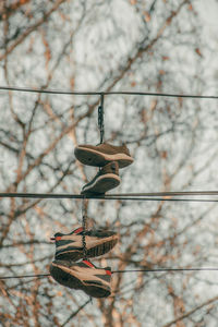 Sneakers hanging on the wire