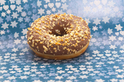 Close-up of food on table against blue background