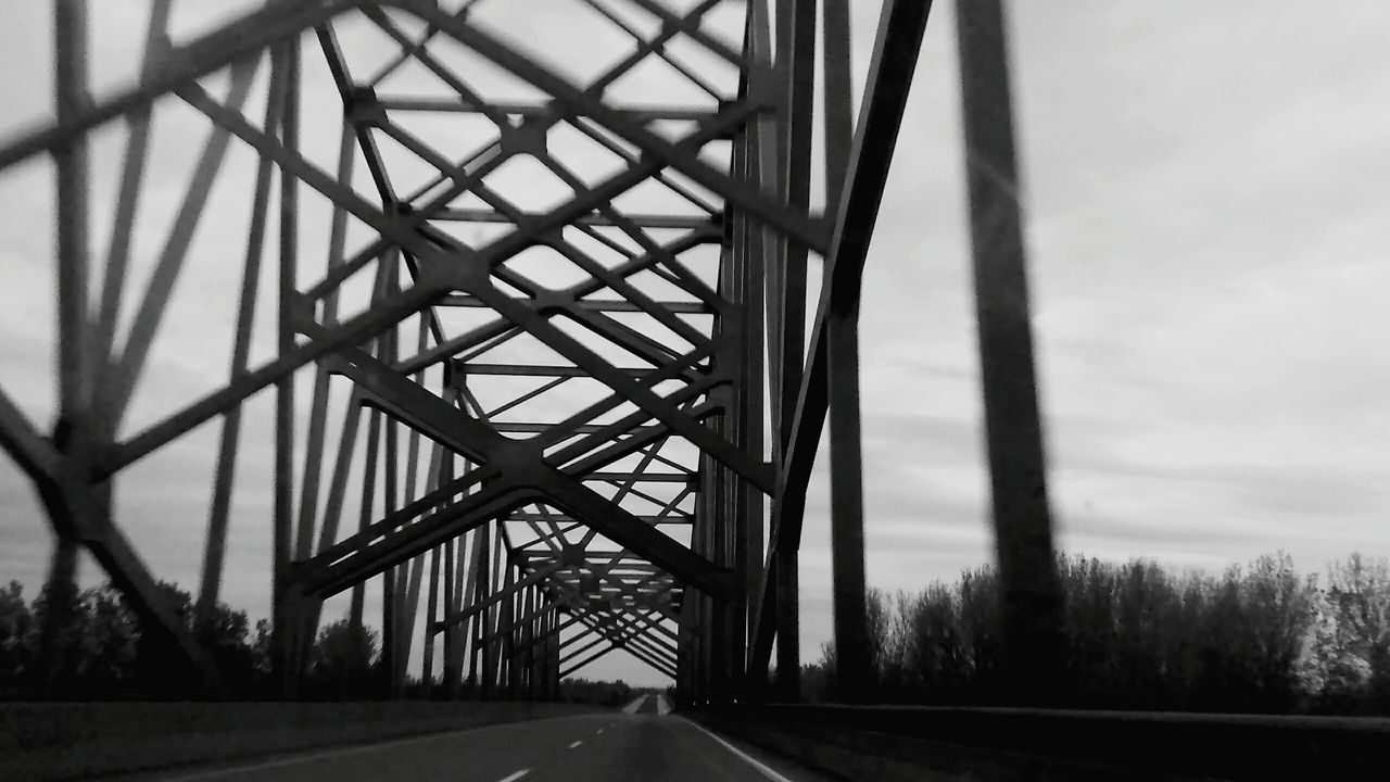 transportation, the way forward, diminishing perspective, connection, road, bridge - man made structure, vanishing point, sky, built structure, architecture, long, road marking, engineering, bridge, tree, no people, empty, railing, metal, outdoors