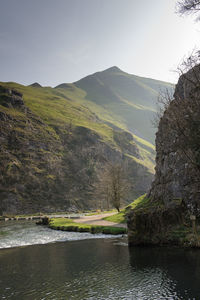 Scenic view of river and mountains