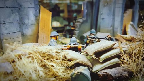 Army soldiers figurine and sack with plants