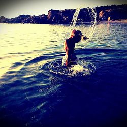 Man jumping in water