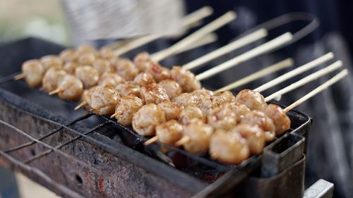 Close-up of meat on barbecue grill