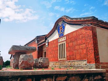 Low angle view of old building against sky