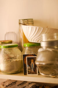 Close-up of jars on shelf