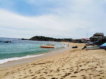 Scenic view of beach against sky