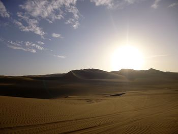 Scenic view of desert against sky