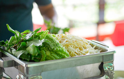 Close-up of person preparing food