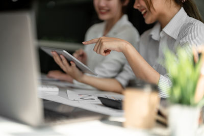 Business colleagues working in office