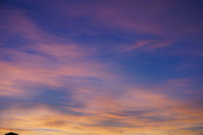 Low angle view of dramatic sky during sunset