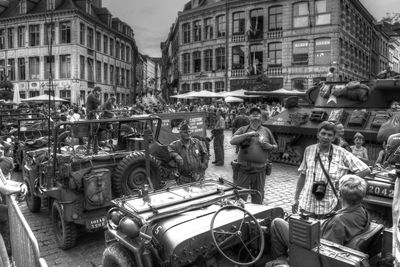 People on street market in city