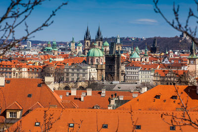 Charles bridge and prague city old town seen from petrin hill in a beautiful early spring day