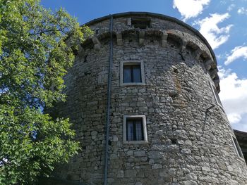 Low angle view of old building against sky