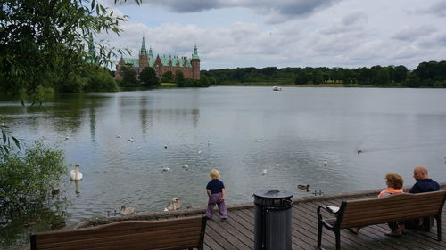 People walking on lake