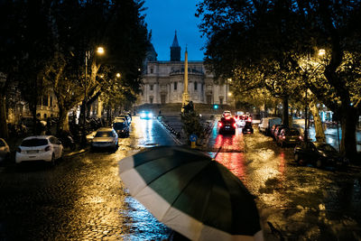 People on street in city at night