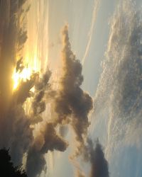 Low angle view of dramatic sky during sunset