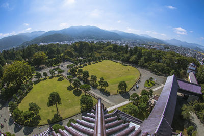 High angle view of trees and mountains against sky