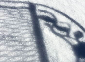 High angle view of shadow on snow