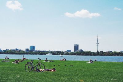 People sitting on bench in park