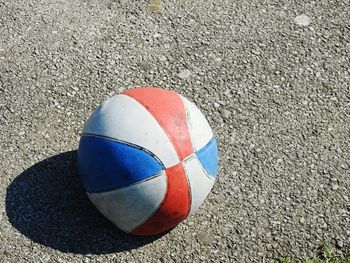 High angle view of multi colored ball on sand at beach