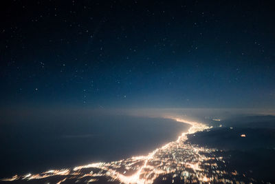 Low angle view of illuminated sky at night