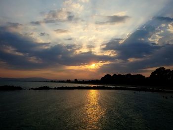 View of calm sea at sunset