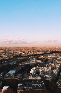 High angle view of city against sky during sunset