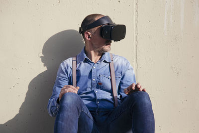 Hipster using virtual reality glasses