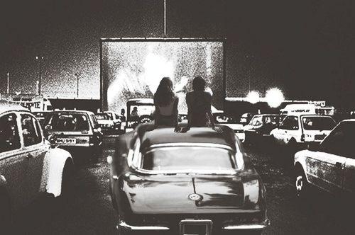 indoors, men, sitting, chair, lifestyles, rear view, person, table, leisure activity, full length, relaxation, standing, dark, illuminated, medium group of people, night, togetherness