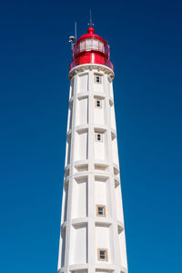 Low angle view of lighthouse against clear sky