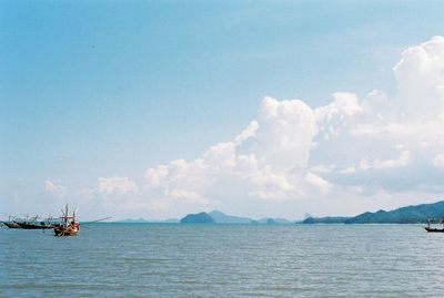 Scenic view of sea against blue sky