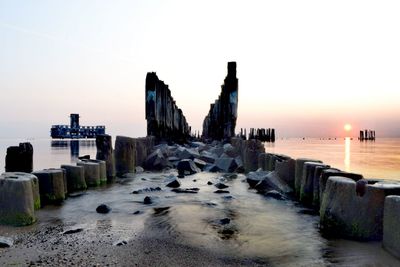 Panoramic view of sea against clear sky during sunset