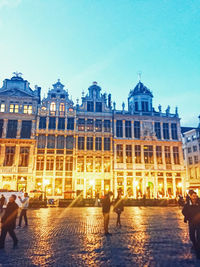 Group of people in front of building