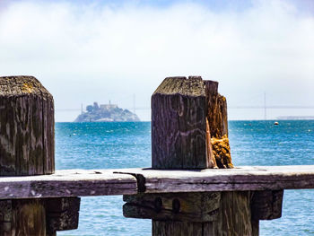 Wooden fence against remote alcatraz island