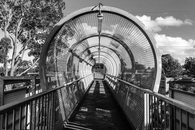 Footbridge against sky