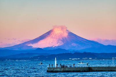 Scenic view of sea against sky during sunrise