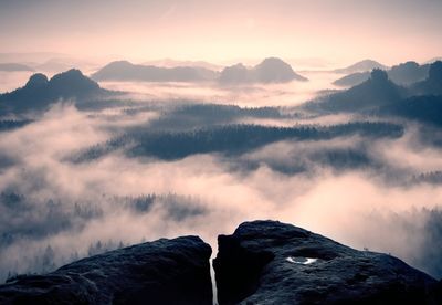 Scenic view of mountains against sky during sunset