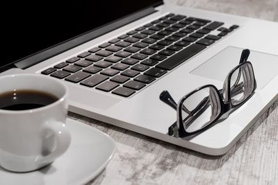 Close-up of coffee cup on table