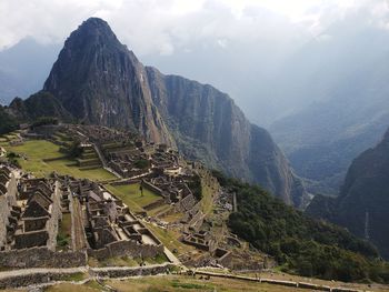 Built structure on mountain against the sky