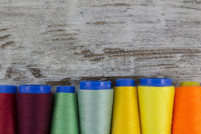 Close-up of multi colored pencils in row