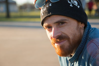 Portrait of bearded adult man smiling