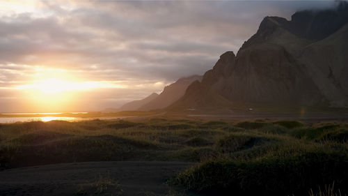 Scenic view of landscape against sky during sunset