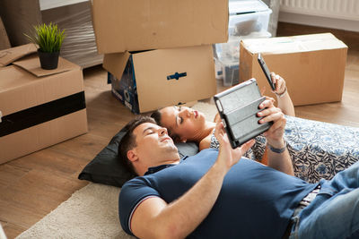 High angle view of business colleagues working at home