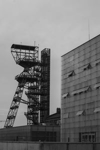 Low angle view of construction site against sky