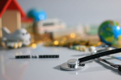 Close-up of telephone on table