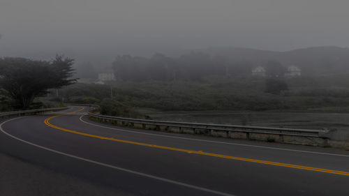 Empty road against sky